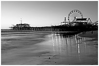 Pier and Ferris Wheel at sunset. Santa Monica, Los Angeles, California, USA (black and white)