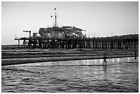 Pier at sunset. Santa Monica, Los Angeles, California, USA (black and white)