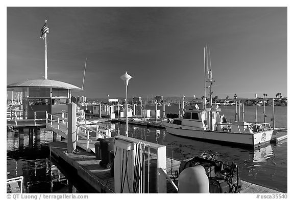 Fishing boat and harbor gas station. Marina Del Rey, Los Angeles, California, USA (black and white)