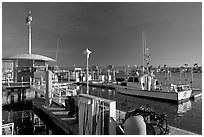 Fishing boat and harbor gas station. Marina Del Rey, Los Angeles, California, USA (black and white)