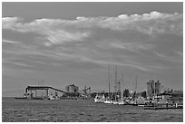 Yachts and industrial installations, port of Redwood, sunset. Redwood City,  California, USA ( black and white)