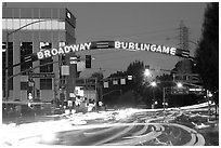 Broadway at dusk with lights from traffic. Burlingame,  California, USA (black and white)