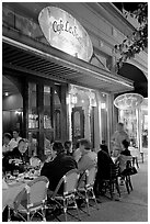 Italian restaurant with diners by night. Burlingame,  California, USA ( black and white)