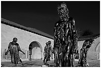 Rodin Burghers of Calais in the Main Quad at night. Stanford University, California, USA (black and white)