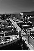 Small boats and dock, Sunnyside marina, Lake Tahoe, California. USA ( black and white)