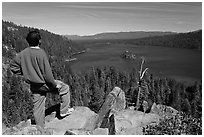 Man standing above Emerald Bay, Lake Tahoe, California. USA (black and white)