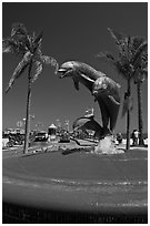 Dolphin statue and wharf. Santa Barbara, California, USA (black and white)