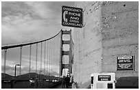 Suicide prevention signs on Golden Gate Bridge. San Francisco, California, USA ( black and white)