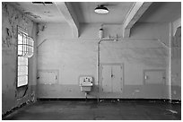 Lavatory and walls in main block, Alcatraz prison. San Francisco, California, USA ( black and white)