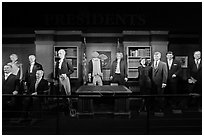 Wax figures of presidents with one outlier, Madame Tussauds. San Francisco, California, USA ( black and white)