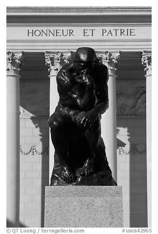 Rodin sculpture The Thinker and Legion of Honor motto in French. San Francisco, California, USA (black and white)