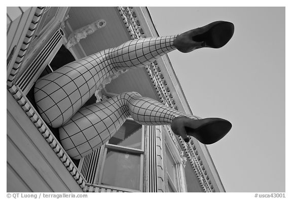 Giant lady legs on Haight street, Haight-Ashbury District. San Francisco, California, USA (black and white)