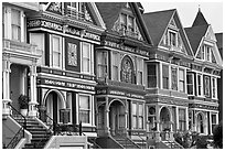 Row of elaborately decorated victorian houses. San Francisco, California, USA ( black and white)