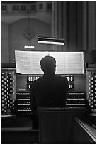 Musician playing organ, Grace Cathedral. San Francisco, California, USA ( black and white)