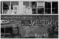 Beatnik area mural and windows with Vesuvio icon and many reflections, North Beach. San Francisco, California, USA (black and white)