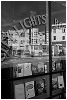 City Light Bookstore storefront with street reflections, North Beach. San Francisco, California, USA (black and white)
