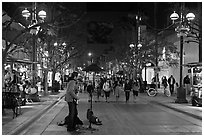 Musician and Third Street Promenade. Santa Monica, Los Angeles, California, USA ( black and white)