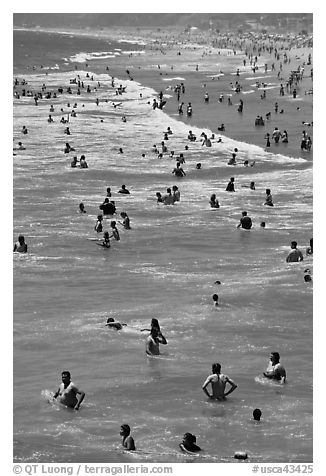 People in water, Santa Monica Beach. Santa Monica, Los Angeles, California, USA (black and white)