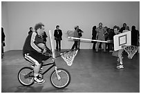 Performance art inside a gallery, Bergamot Station. Santa Monica, Los Angeles, California, USA (black and white)