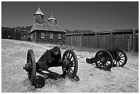 Cannons and chapel, Fort Ross Historical State Park. Sonoma Coast, California, USA (black and white)