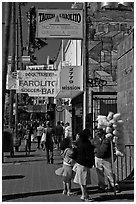 Mission street sidewalk, Mission District. San Francisco, California, USA ( black and white)