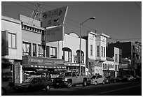 Shops, Mission Street, late afternoon, Mission District. San Francisco, California, USA ( black and white)