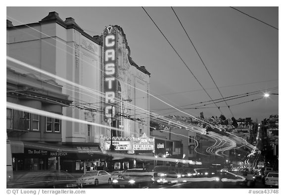 Traffic blurs and Castro Theater at dusk. San Francisco, California, USA (black and white)