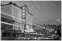 Traffic blurs and Castro Theater at dusk. San Francisco, California, USA ( black and white)