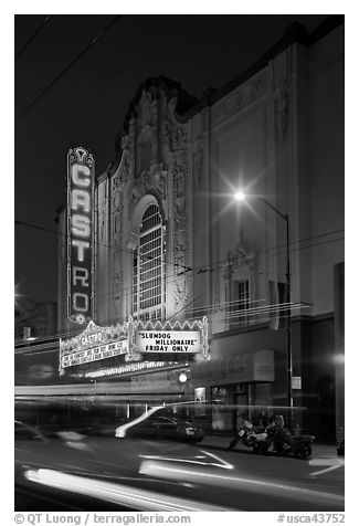 Light blurs and Castro Theater at night. San Francisco, California, USA (black and white)