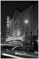 Light blurs and Castro Theater at night. San Francisco, California, USA ( black and white)