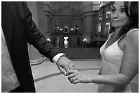 Newly wed bride looks over rings, City Hall. San Francisco, California, USA ( black and white)