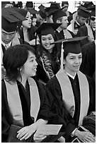 Students in academical dress sitting during graduation ceremony. Stanford University, California, USA ( black and white)