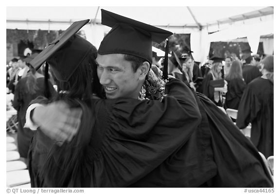 Just graduated students hugging each other. Stanford University, California, USA (black and white)