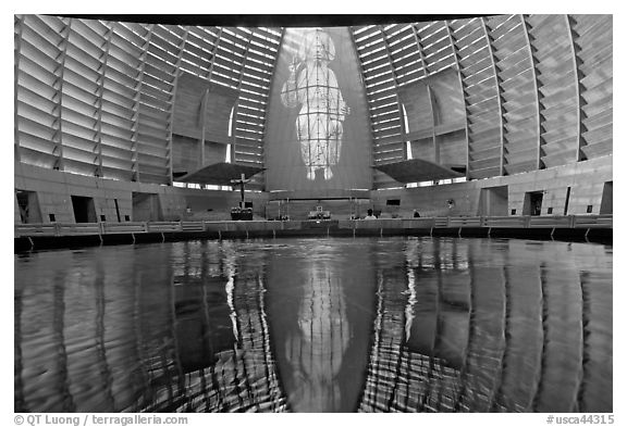 Interior reflected in Baptismal font, Oakland Cathedral. Oakland, California, USA (black and white)