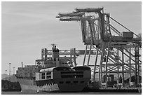 Cranes and cargo ship, Oakland port. Oakland, California, USA (black and white)