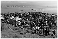 Crowds gather for mavericks competition. Half Moon Bay, California, USA (black and white)