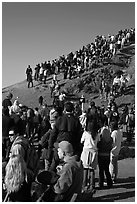 Spectators on bluff during mavericks contest. Half Moon Bay, California, USA ( black and white)