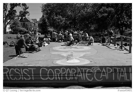 People gathered behind podium, Peoples Park. Berkeley, California, USA (black and white)