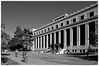 Students biking in front of Life Sciences building. Berkeley, California, USA ( black and white)