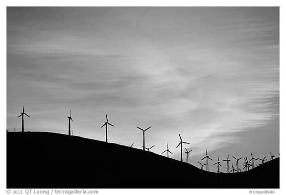 Wind farm silhouetted on hill, Altamont. California, USA (black and white)