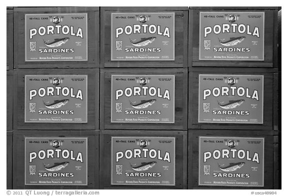 Boxes of canned sardines, Monterey Bay Aquarium. Monterey, California, USA (black and white)