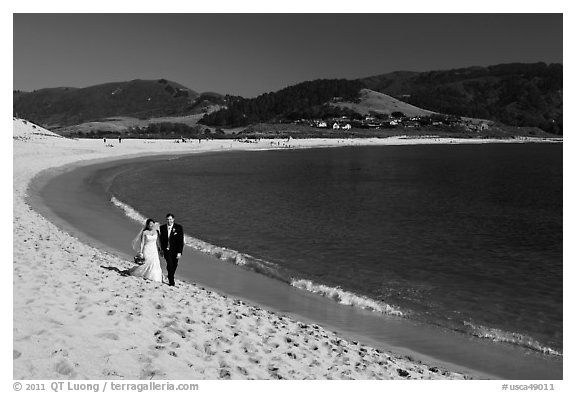 Groom and bride, Carmel River Beach. Carmel-by-the-Sea, California, USA