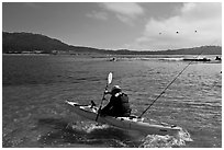 Sea kayaking into Carmel Bay. Carmel-by-the-Sea, California, USA ( black and white)