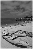 Sea kayaks on beach, Lovers Point. Pacific Grove, California, USA ( black and white)