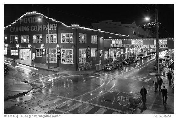 Monterey Canning company building and streets at night. Monterey, California, USA (black and white)
