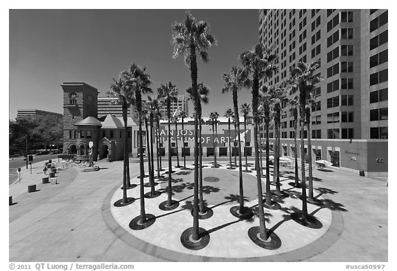 Circle of palm trees and San Jose Museum of Art. San Jose, California, USA (black and white)