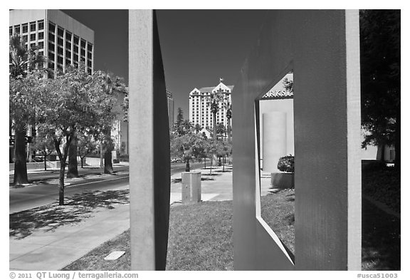 Downtown San Jose seen through colorful modern sculpture. San Jose, California, USA (black and white)