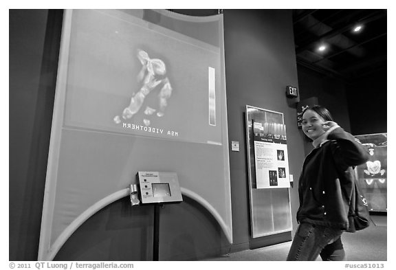 Woman imaged by thermal camera, Tech Museum. San Jose, California, USA