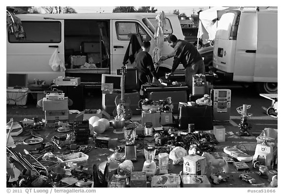 Vans and household items for sale, San Jose Flee Market. San Jose, California, USA (black and white)