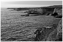 Sandstone sea cliffs at sunset, Wilder Ranch State Park. California, USA ( black and white)